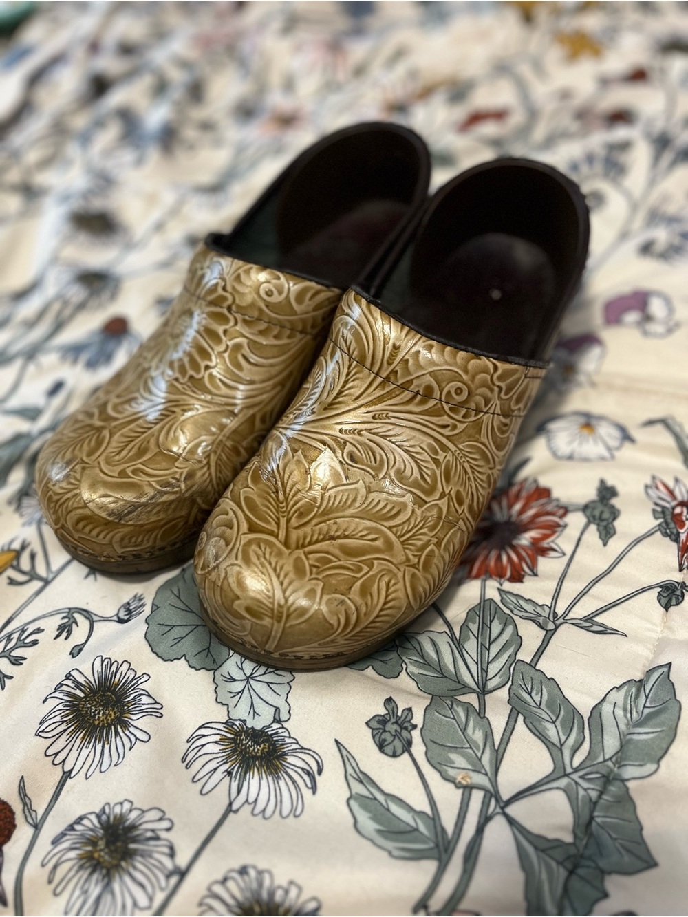 Dankso Women's Embossed Gold Slip-On Clogs